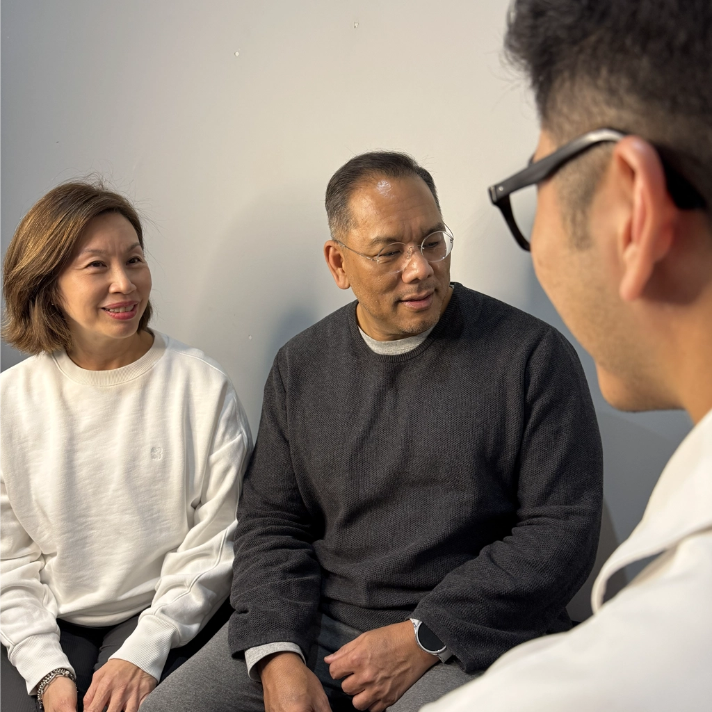 Ringwood chiropractor conducting an initial consultation and discussing patient symptoms